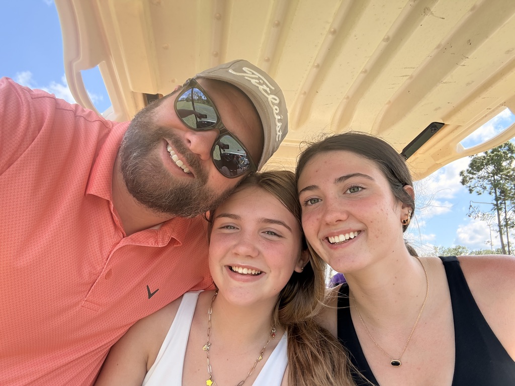 Graylon with his daughters